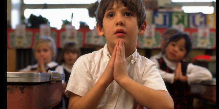 Education Department warns against schools encouraging private prayer, other religious activity