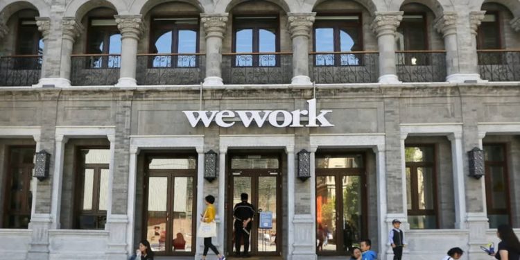 IWG share price could benefit as WeWork stock implodes