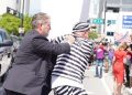 Protester in prison costume detained after rushing Trump’s motorcade outside Miami courthouse