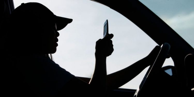 Michigan passes statewide ban on handheld phone use in cars