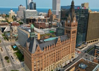 Evers signs bipartisan sales tax bill aimed at sparing Milwaukee from bankruptcy