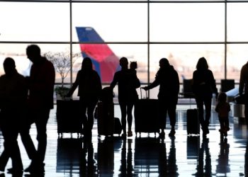 State Department expands passport phone center hours, and U.S. senator calls for more hiring amid flood of applications