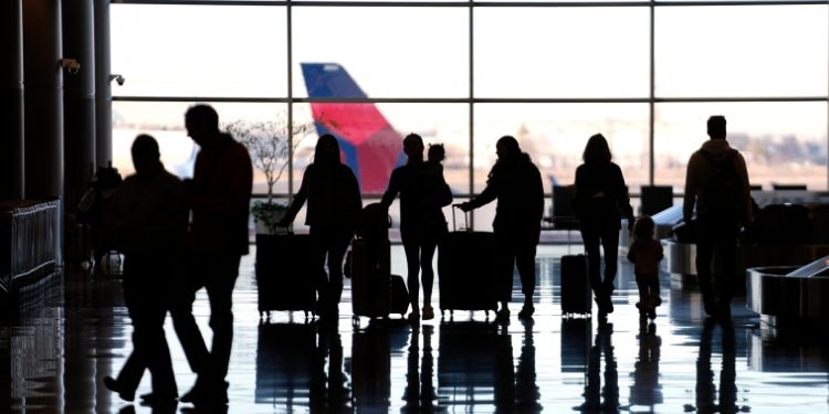 State Department expands passport phone center hours, and U.S. senator calls for more hiring amid flood of applications