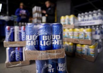 Bud Light maker Anheuser-Busch to lay off hundreds of employees, company says