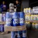 Bud Light maker Anheuser-Busch to lay off hundreds of employees, company says