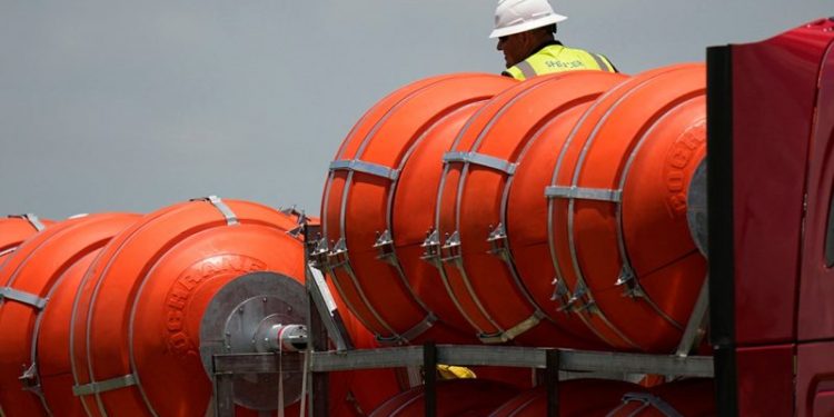 Abbott moves ahead with floating border barriers on Rio Grande despite liberal outrage