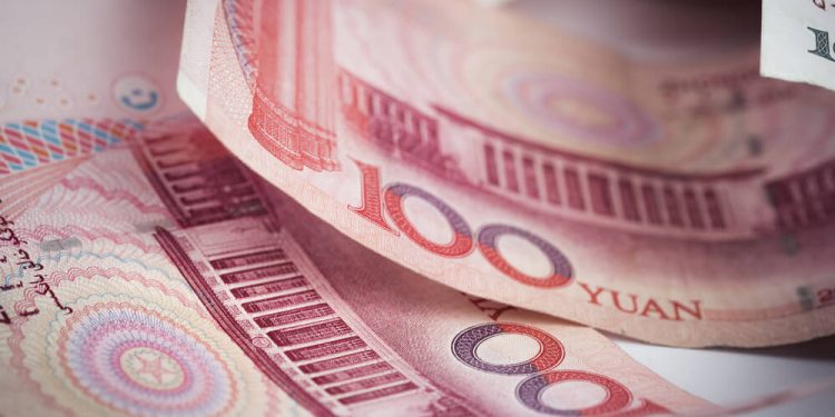 China’s Yuan Strengthens Past Key Level