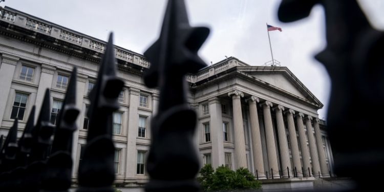 Fitch downgrades U.S. credit rating from top score after debt ceiling crisis