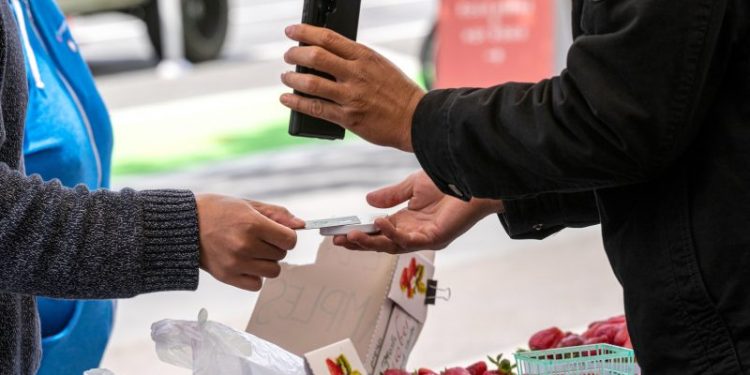 Inflation is driving up consumer credit card debt by billions of dollars