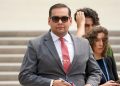 Embattled GOP Rep. George Santos, ex-campaign aide seem to be discussing plea deals with federal prosecutors