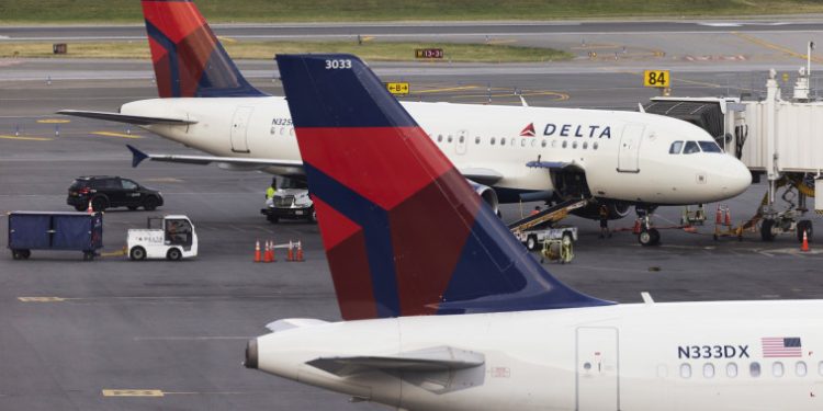 Delta says Hollywood and auto strikes are denting business travel