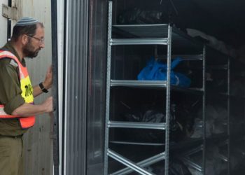 At the army base where Israel identifies its dead: ‘They went from house to house burning family after family’