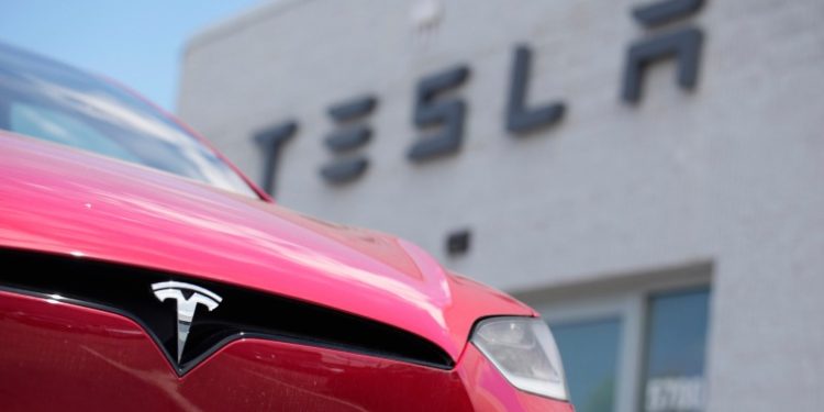 Tesla recalls 120,000 vehicles over potentially faulty doors that could open in a crash