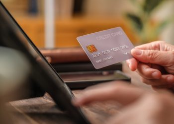 American Express surpasses EPS forecasts and raises guidance, yet shares fall