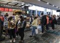 Can Starbucks fix long lines at its airport cafes?