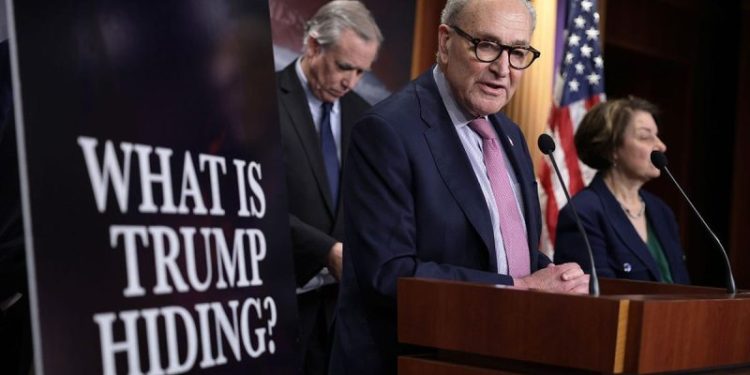 Schumer accuses DOJ of breaking the law over redacted Epstein files