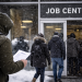 US jobless claims climb amid storms, but labour market holds steady